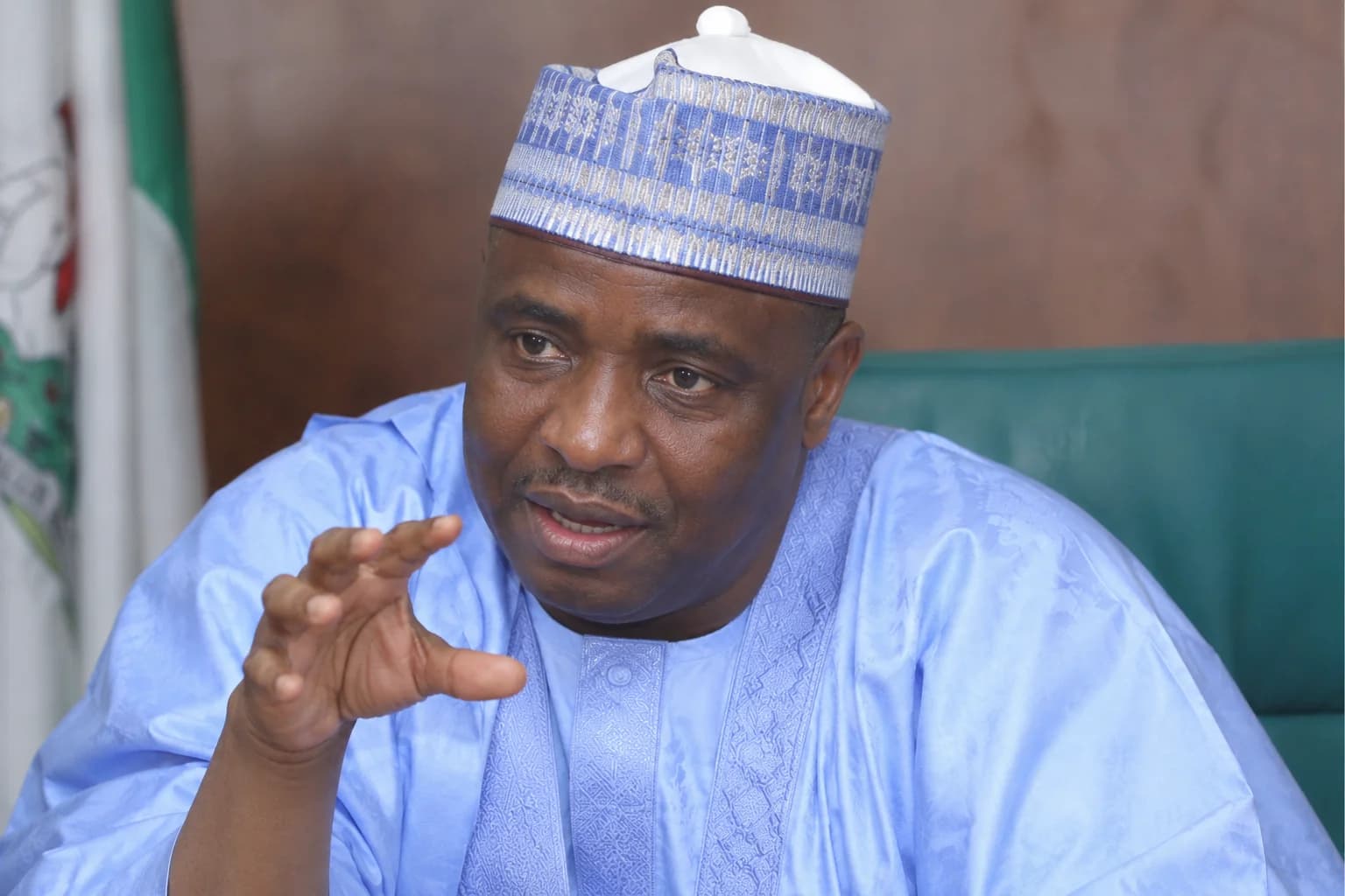 Former Sokoto State governor Aminu Waziri Tambuwal speaking at a political gathering as he calls on Nigerians to unite and vote President Bola Tinubu’s administration out of office in the 2027 election.