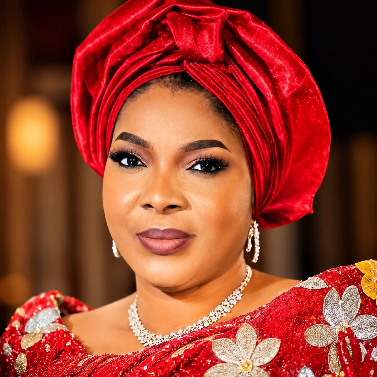 Abia First Lady Priscilla Otti presenting ₦50,000 business grants to widows in Umuahia.