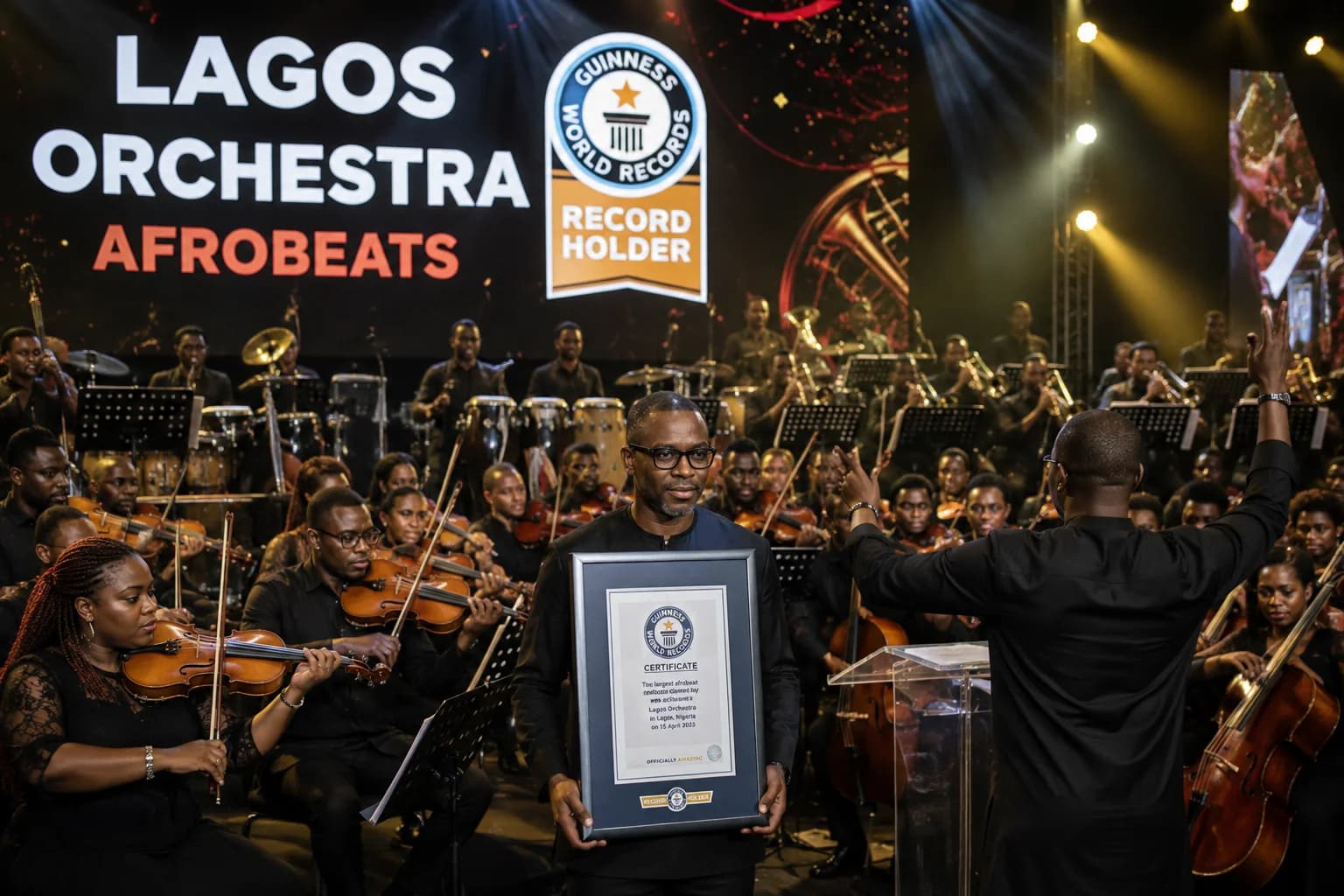 A large orchestra of musicians performs Afrobeats live on stage at the Balmoral Convention Centre in Lagos during Dapper Live & Artists’ Guinness World Record performance.