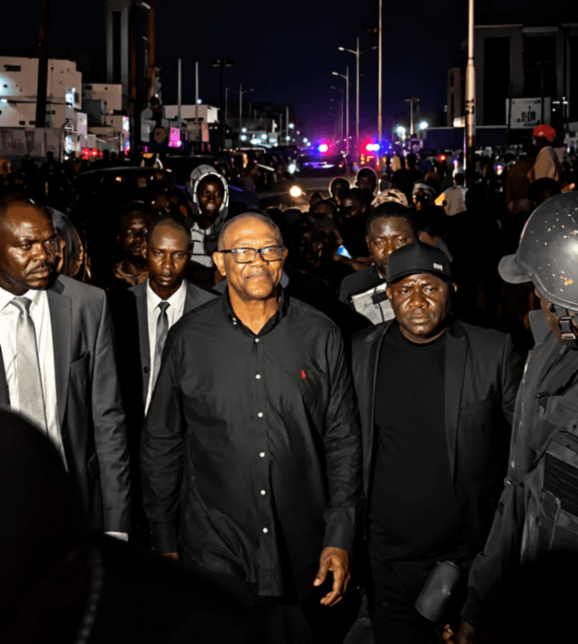 Peter Obi surrounded by a large crowd during the funeral rites of Archbishop Augustine Akubeze in Edo State.